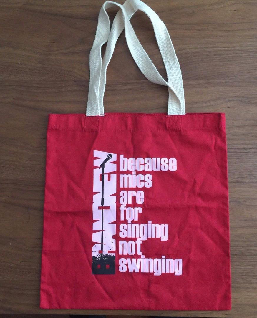 Brand New Red "because mics are for singing not swinging" tote bag