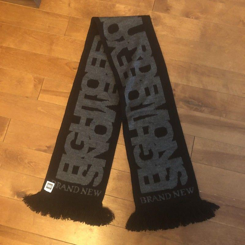 Brand New Fight Off Your Demon woven scarf
Black scarf with words "fight off your demons."